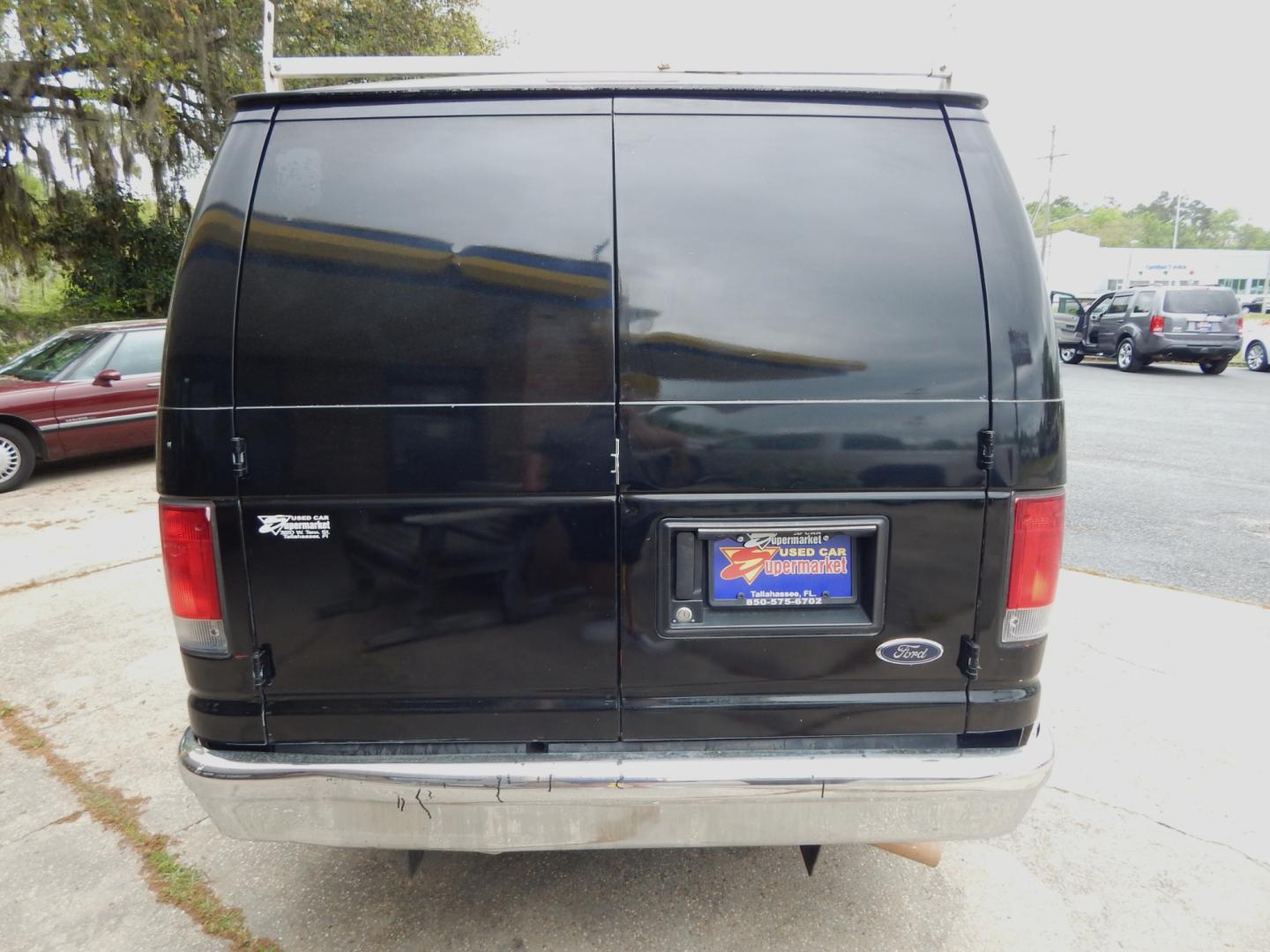 2014 Black Ford E-Series Van (1FTNE1EW6ED) with an V8 engine, Automatic transmission, located at 3120 W Tennessee St, Tallahassee, FL, 32304-1002, (850) 575-6702, 30.458841, -84.349648 - Used Car Supermarket is proud to present you with this loaded immaculate 2014 Ford E150 Econoline Work Van. Used Car Supermarket prides itself in offering you the finest pre-owned vehicle in Tallahassee. Used Car Supermarket has been locally family owned and operated for over 48 years. Our E150 Work - Photo#3